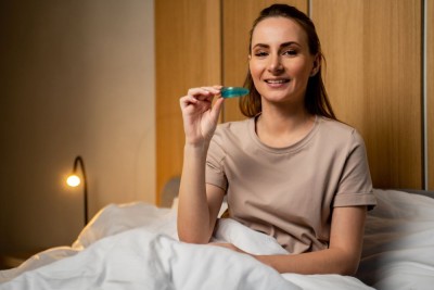 woman with sleep apnea device